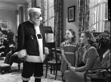 Edmund Gwenn, Natalie Wood, and Maureen O'Hara in a scene from MIRACLE ON 34TH STREET, 1947.